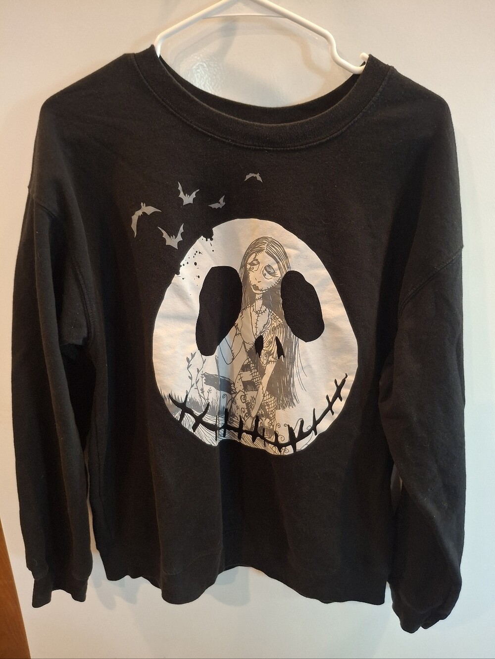 Disney Black Pullover Sweatshirt with White Jack Skellington Face Graphic